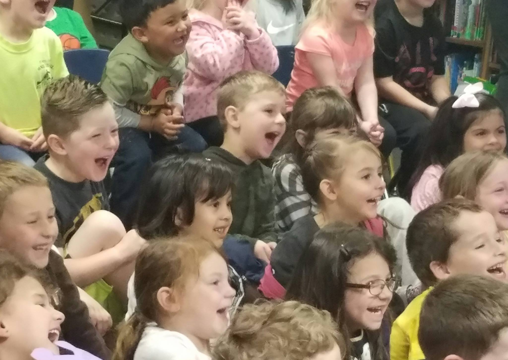 New Hampshire preschoolers laughing at Mr. Magichead show