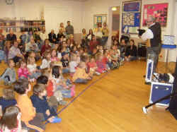 Mr. Magichead performing for large preschool graduation event.